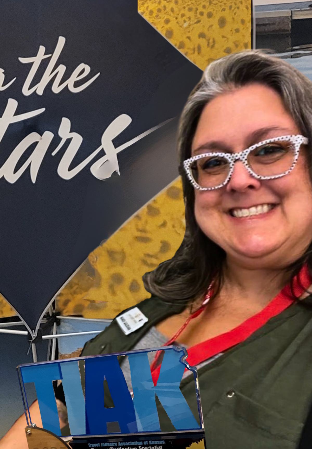 photo of a white woman with brown hair and glasses.
